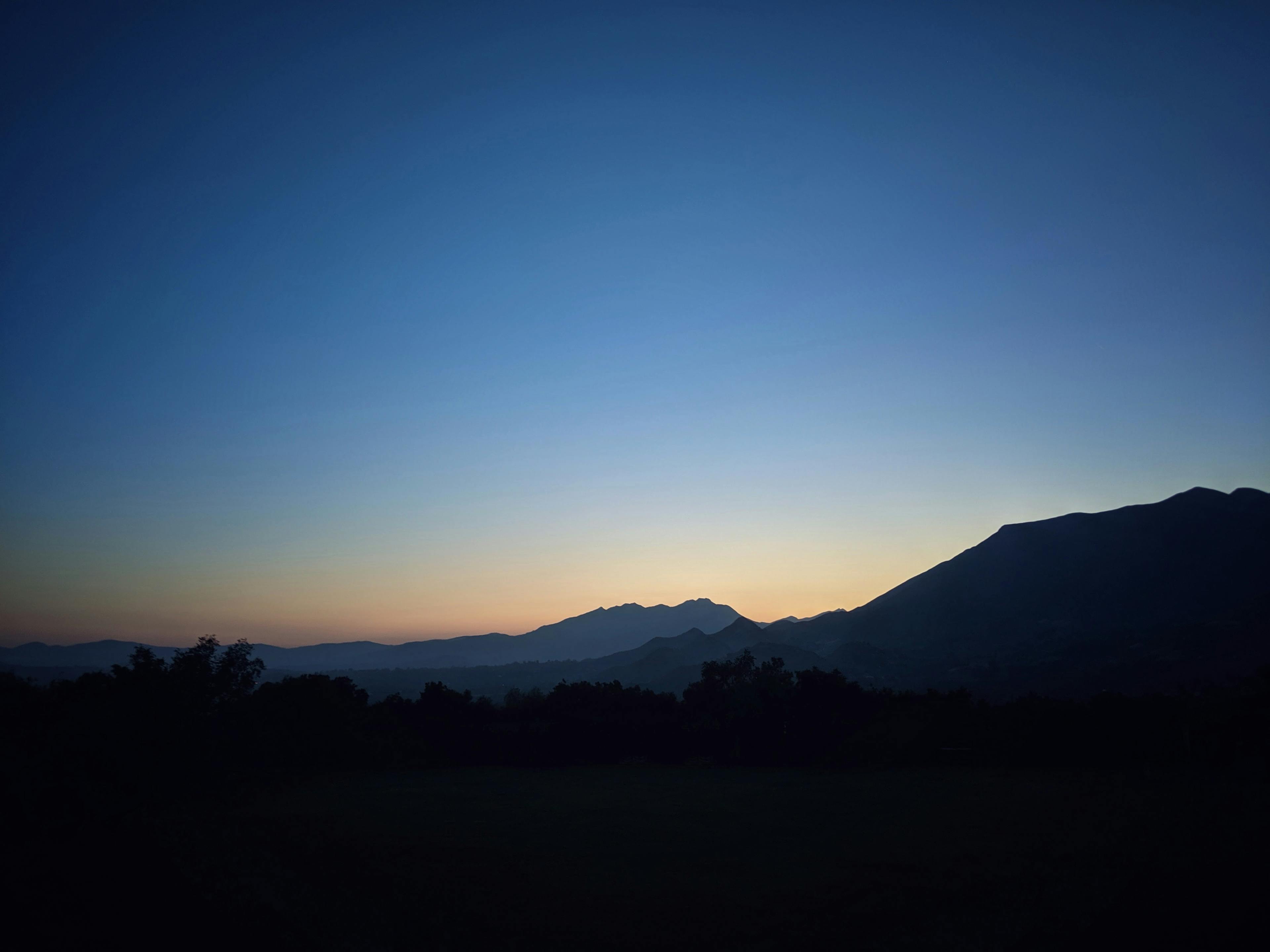 Mountains silhouetted at dusk in Ojai, California